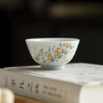 Hand-Painted White Porcelain Teacup – Twelve Flower Goddesses Collection
