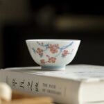 Hand-Painted White Porcelain Teacup – Twelve Flower Goddesses Collection
