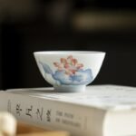Hand-Painted White Porcelain Teacup – Twelve Flower Goddesses Collection